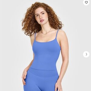 ONER ACTIVE SOFTMOTION™ STRAPPY MID VEST WITH BUILT IN BRA SHELF WITH WHITE LOGO